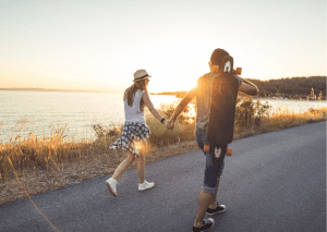 These people are having fun with the use of the electric skateboard. 