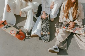Experienced skateboarders taking a break for physical and mental wellness.