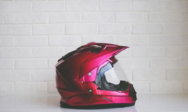 A red helmet placed in a safe and clean area