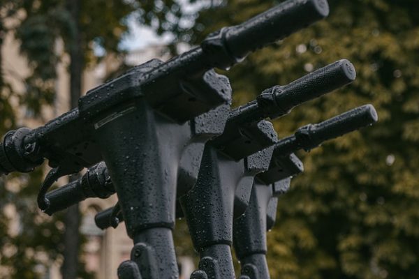 Several handlebars with rainwater