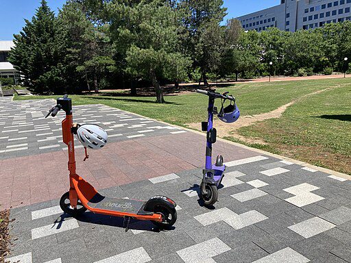 It's a beautiful day to ride scooter at the park 