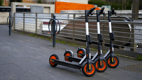 Three identical scooters