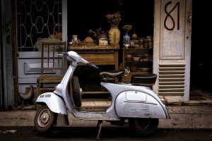 A scooter in the street, ready for any kind of expedition.