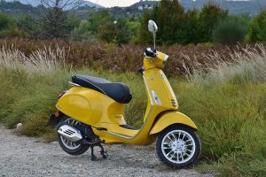 A yellow outdoor scooter