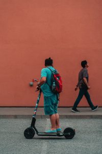 The picture shows an electric scooter for heavy adults. It is nice to use an electric scooter when touring around.