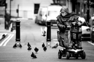 Woman on a scooter