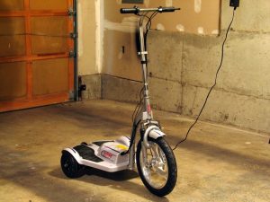 charging electronic version of 3 wheel scooters