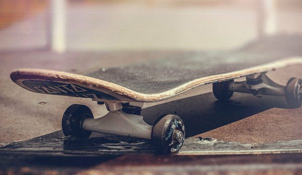 skating gears: A Black Santa Cruz (Skate Brand) Skateboard. 