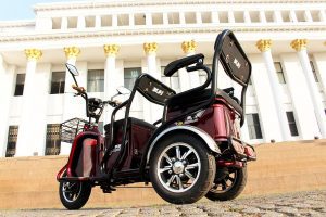 scooters with three wheels parked