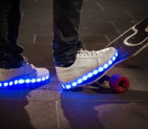 These white skateboard shoes feature integrated LED lights. Check online review. 