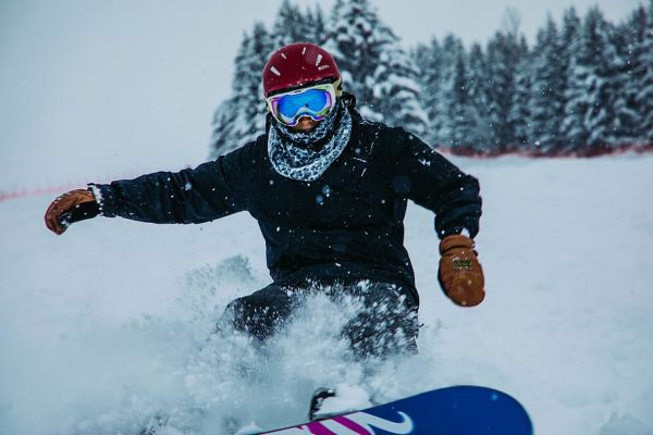 Snowboard in frosty weather.As the colder season descends upon us, riders encounter a unique set of challenges and opportunities.