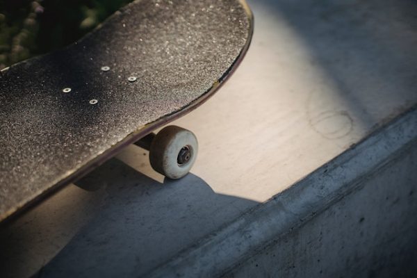 Also known as sidewalk surfing, it originated in California.