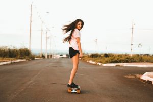 Skateboarder riding her skateboard