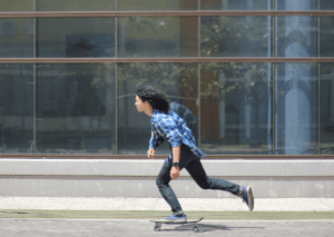 seamless journey on a paved street by a young rider