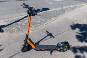 An orange colored scooter 