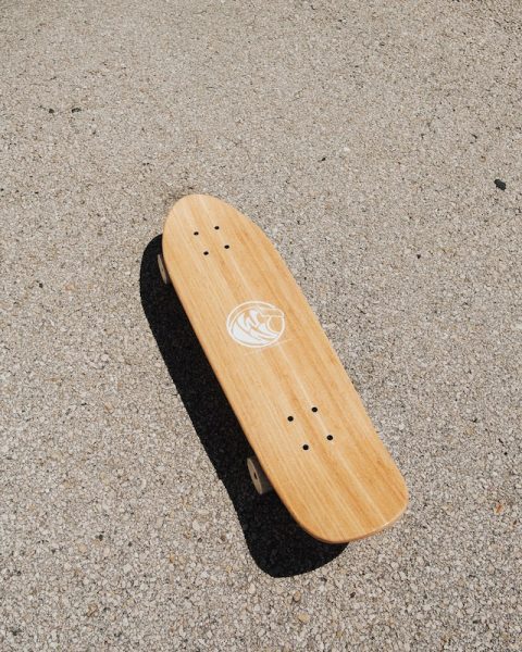 Light brown vert skateboard that is prepared for all skateboarding adventures.