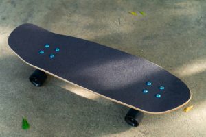 Skateboard gear with a black deck