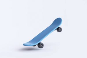 blue skateboard, skateboard trick, mini skateboard, skateboard ollie