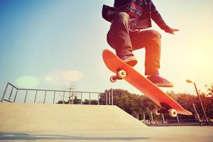 A skateboarder practicing how to perform manuals.