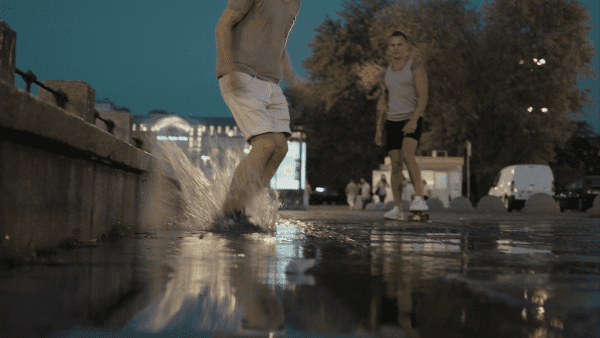 Skateboard on wet road