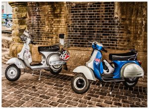 There are two moped scooter.