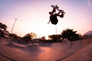 A person is doing a skateboarding stunts.