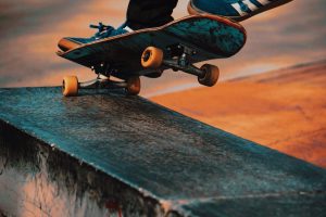 Skateboard with orange wheels