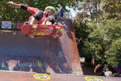 a skater enjoying skateboarding time with other beginners skaters with skateboards