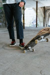 Skateboarder using a skateboard.