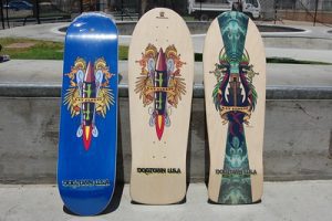 The skateboards have old and retro designs on the surface of it. 