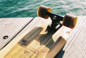 A photo of a skateboard's trucks and wheel parts