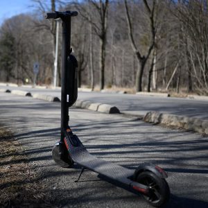 Electric scooter parked on street