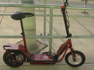 Seated electric scooter