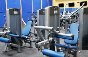 A fitness room with modern exercise machines