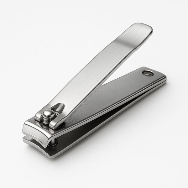 Single stainless steel nail clipper, closed, on a seamless white background showing safe edges and polish.